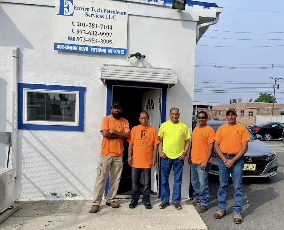 The expert service team of ENVIRO-TECH Petroleum Services standing outside their office in Totowa, New Jersey.